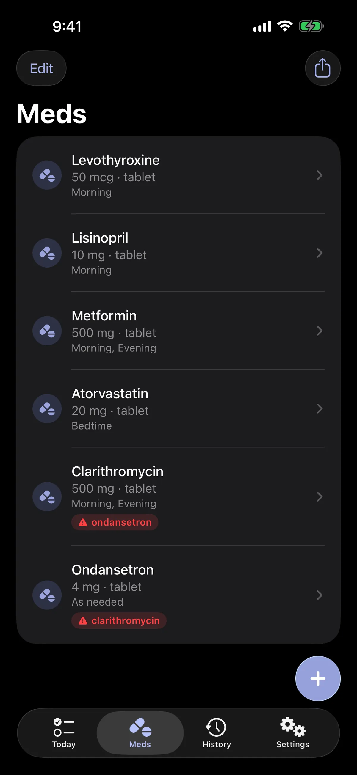 Medication library in dark mode with interaction warnings on the list