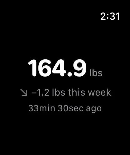 Apple Watch app showing the latest weight, weekly trend, and time since the last weigh-in