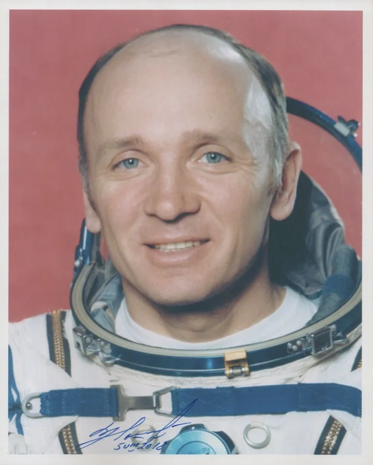 Cosmonaut Valentin Lebedev in his spacesuit — a signed portrait.