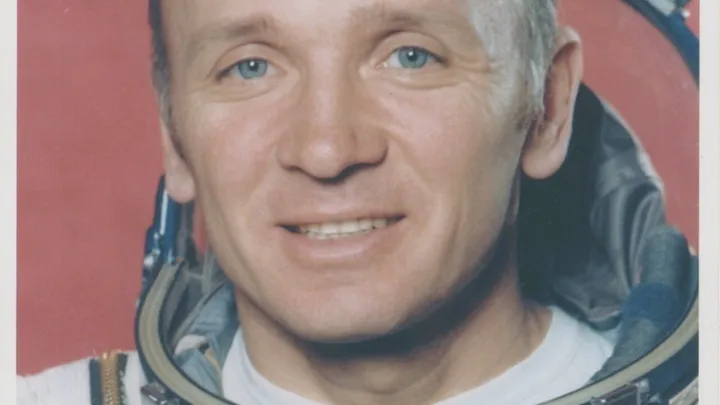 Cosmonaut Valentin Lebedev in his spacesuit — a signed portrait.